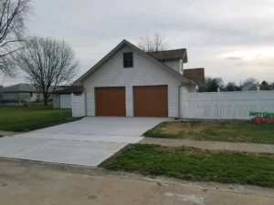 Photo of new garage and concrete